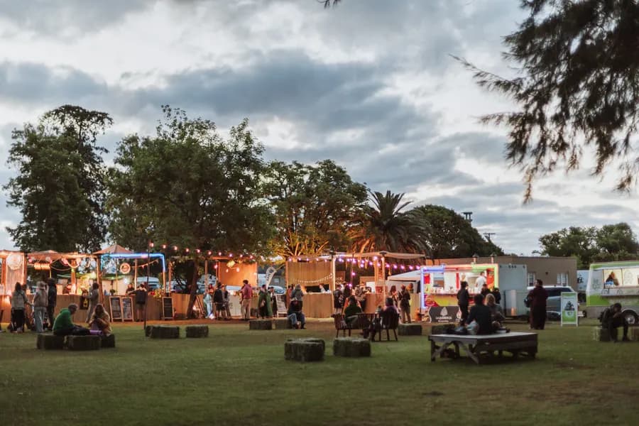 People sharing tables and food at the Amanita food court